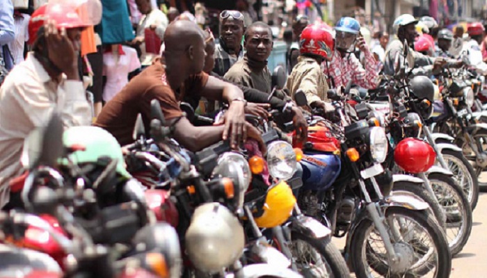 A group of Okada riders in Accra Central waiting for clients.