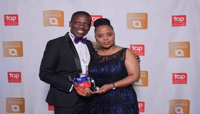 Hollard Group CEO, Patience Akyianu receiving the award