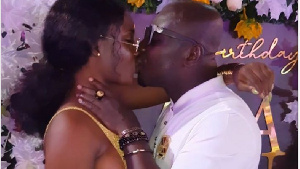 The controversial Osebo is seen passionately sharing a kiss with his girlfriend in public.