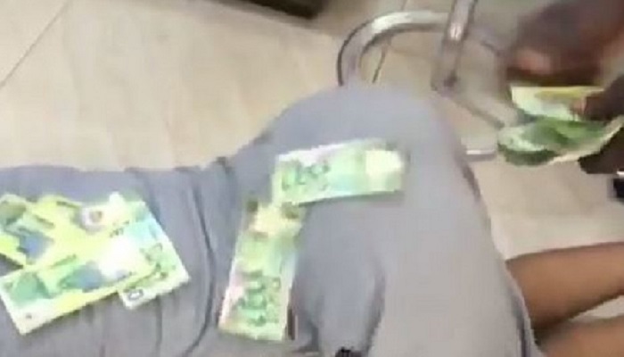 Osebo spraying cash on Akuapem Poloo