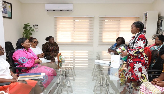 The models interacting with First Lady Rebecca Akufo-Addo