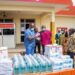 Dr Matthew Opoku Prempeh , Education Minister presenting some items to Manhyia Government Hosp.