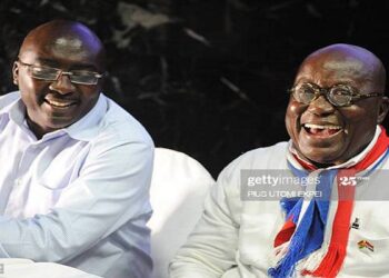 Presidential candidate of the opposition New Patriotic Party Nana Akufo-Addo (L) laughs beside Vice-presidential candidate Mahamudu Bawumia during a press point on planned legal action to challenging the recent presidential election results, in Accra on December 11, 2012. Ghana's main opposition candidate Nana Akufo-Addo on Tuesday refused to accept presidential election results giving victory to incumbent John Dramani Mahama and vowed to challenge them in court. Speaking at a rally of several hundred people in the capital, Akufo-Addo urged supporters to remain peaceful, but spoke out strongly against the results after his New Patriotic Party alleged a "pattern of fraud" in the election.  AFP PHOTO / PIUS UTOMI EKPEI        (Photo credit should read PIUS UTOMI EKPEI/AFP via Getty Images)