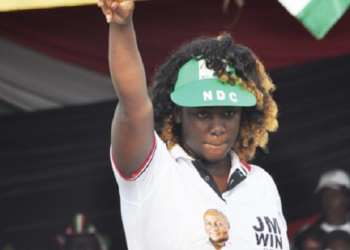 A photo of Tracey Boakye campaigning for the National Democratic Congress