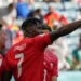 Switzerland’s Breel Embolo celebrates scoring the only goal in his side’s win over his native Cameroon (Luca Bruno/AP)