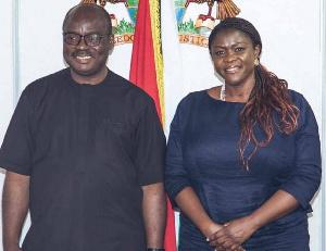 Bank of Ghana Governor, Dr. Ernest Addison and NCCE Chairperson, Kathleen Addy