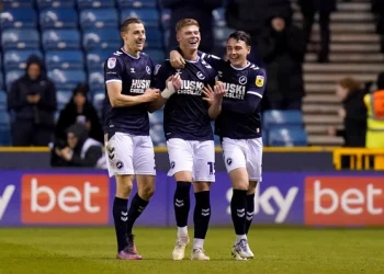 Millwall’s Charlie Cresswell (centre) celebrates with his team-mates after scoring