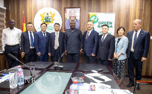 Lands Minister Samuel A. Jinapor in group photo with the delegation from Wuhan