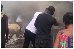 Some shop owners trying to salvage remnants of goods from their shops