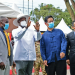 President Museveni (2nd right) with his entourage