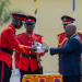 President Nana Addo Dankwa Akufo-Addo (right) handing over a sword to one of the graduates