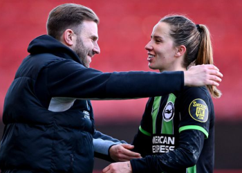 Interim boss Mikey Harris congratulates Tatiana Pinto at full-time