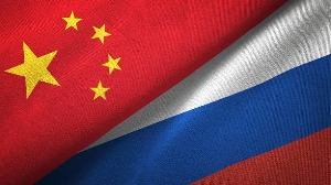 A photo of China, Russia flags