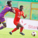 Former Kotoko player Eric Zeze (middle) in action against Medeama