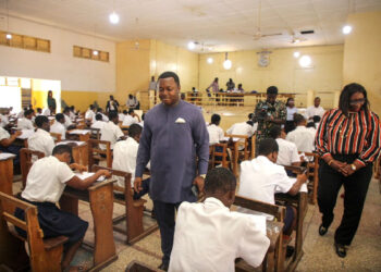 Rev. Ntim Fordjour inspecting the ongoing examination